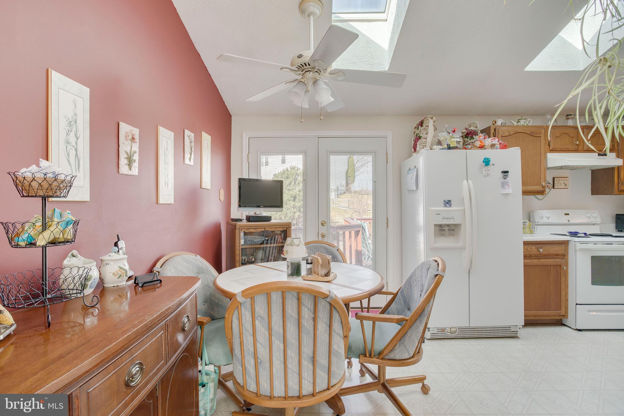 2032 Cross Trails Road Baltimore, MD 21244 - Photo 14 of 33 Eating area in kitchen with French door to deck