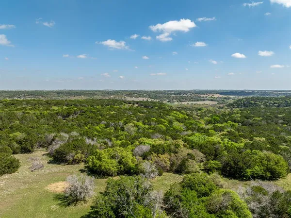 a view of a yard with an outdoor space