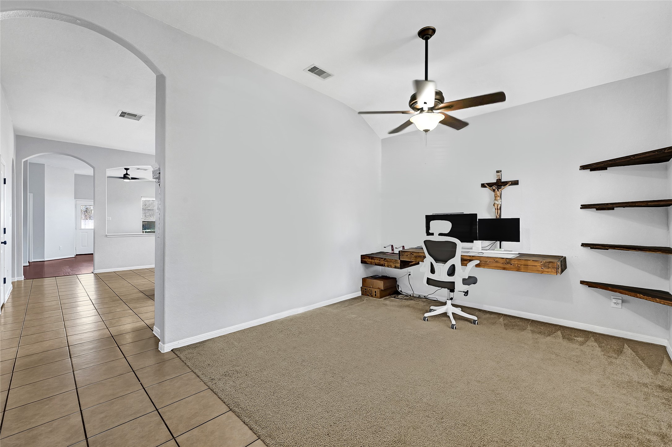 11 Supiro Court Manvel, TX 77578 - Photo 14 of 21 a view of a livingroom with a workspace
