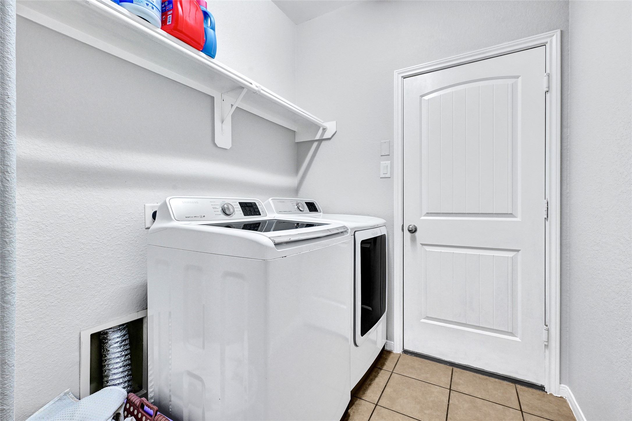 11 Supiro Court Manvel, TX 77578 - Photo 19 of 21 a utility room with dryer and washer