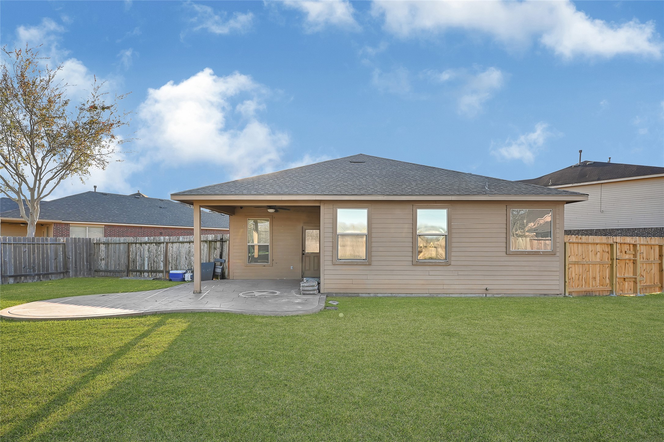 11 Supiro Court Manvel, TX 77578 - Photo 20 of 21 a front view of a house with a yard and trees