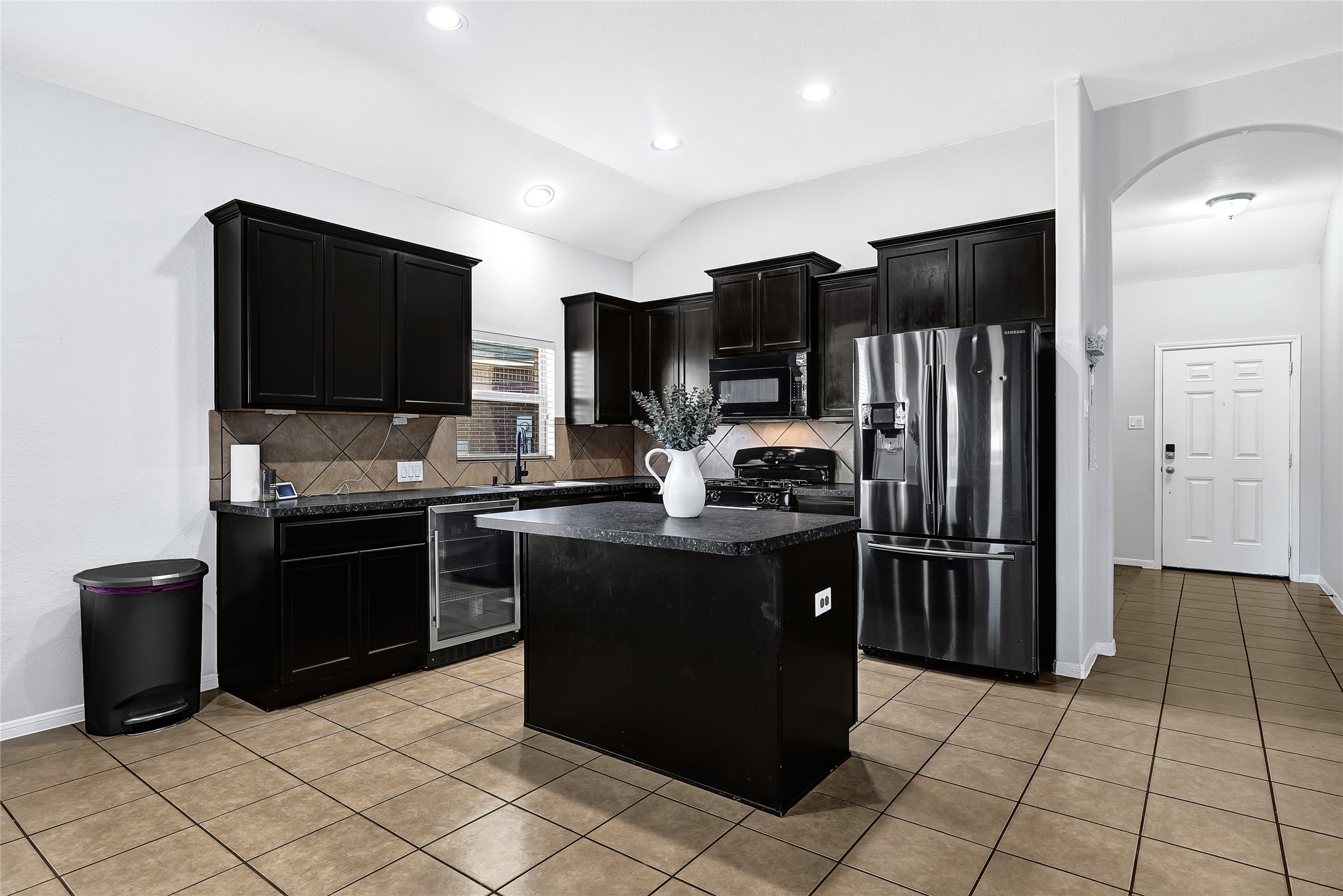11 Supiro Court Manvel, TX 77578 - Photo 10 of 21 a kitchen with stainless steel appliances granite countertop a refrigerator stove and oven