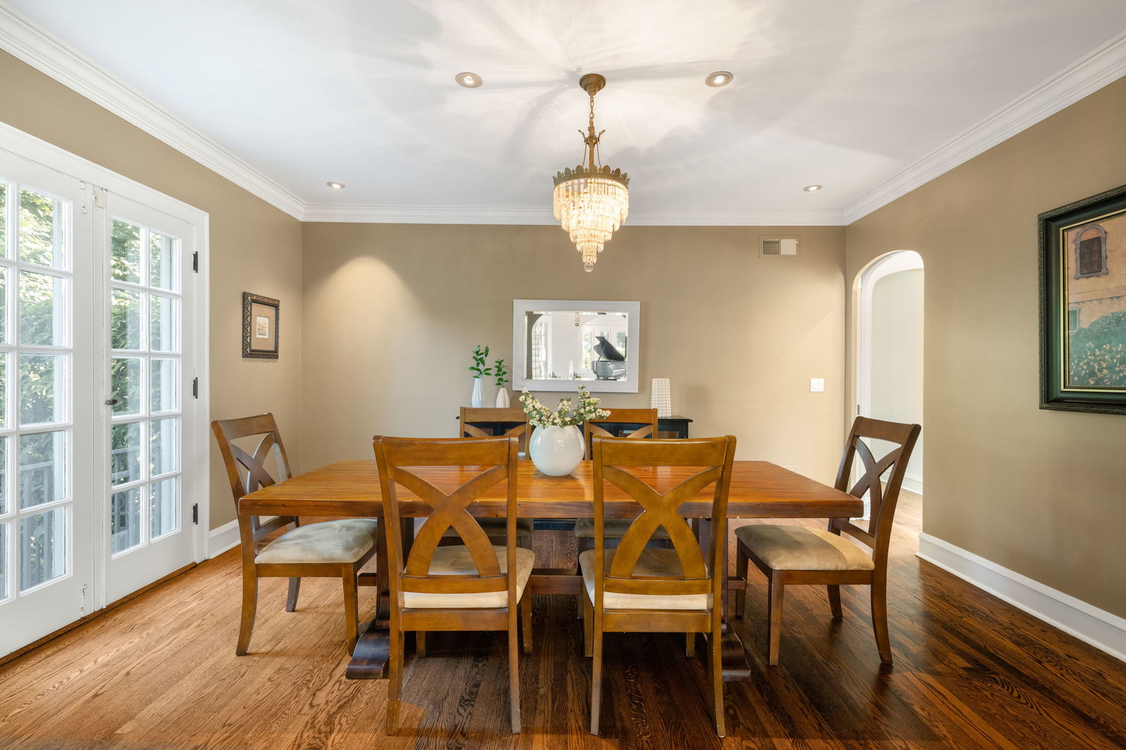693 Sheridan Road Wilmette, IL 60091 - Photo 11 of 45 a view of a dining room with furniture wooden floor and chandelier