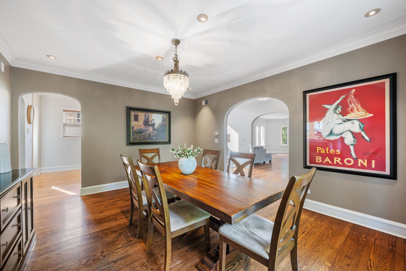 693 Sheridan Road Wilmette, IL 60091 - Photo 12 of 45 a view of a dining room with furniture wooden floor and a chandelier