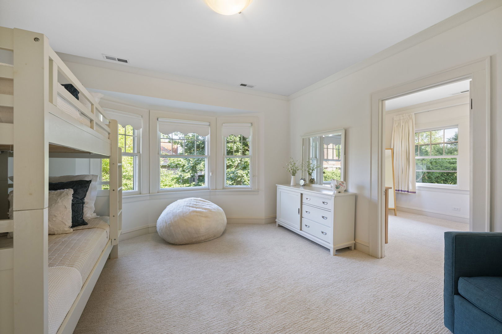 693 Sheridan Road Wilmette, IL 60091 - Photo 21 of 45 a living room with furniture and a large window