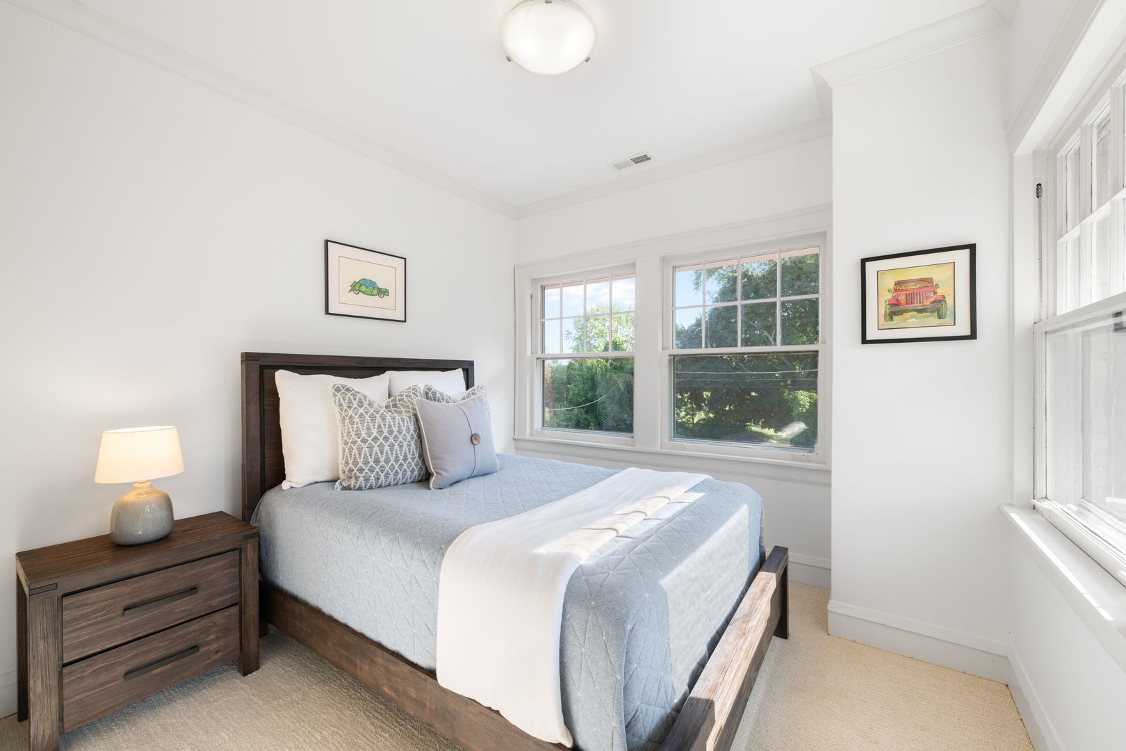 693 Sheridan Road Wilmette, IL 60091 - Photo 25 of 45 a bedroom with a bed and window