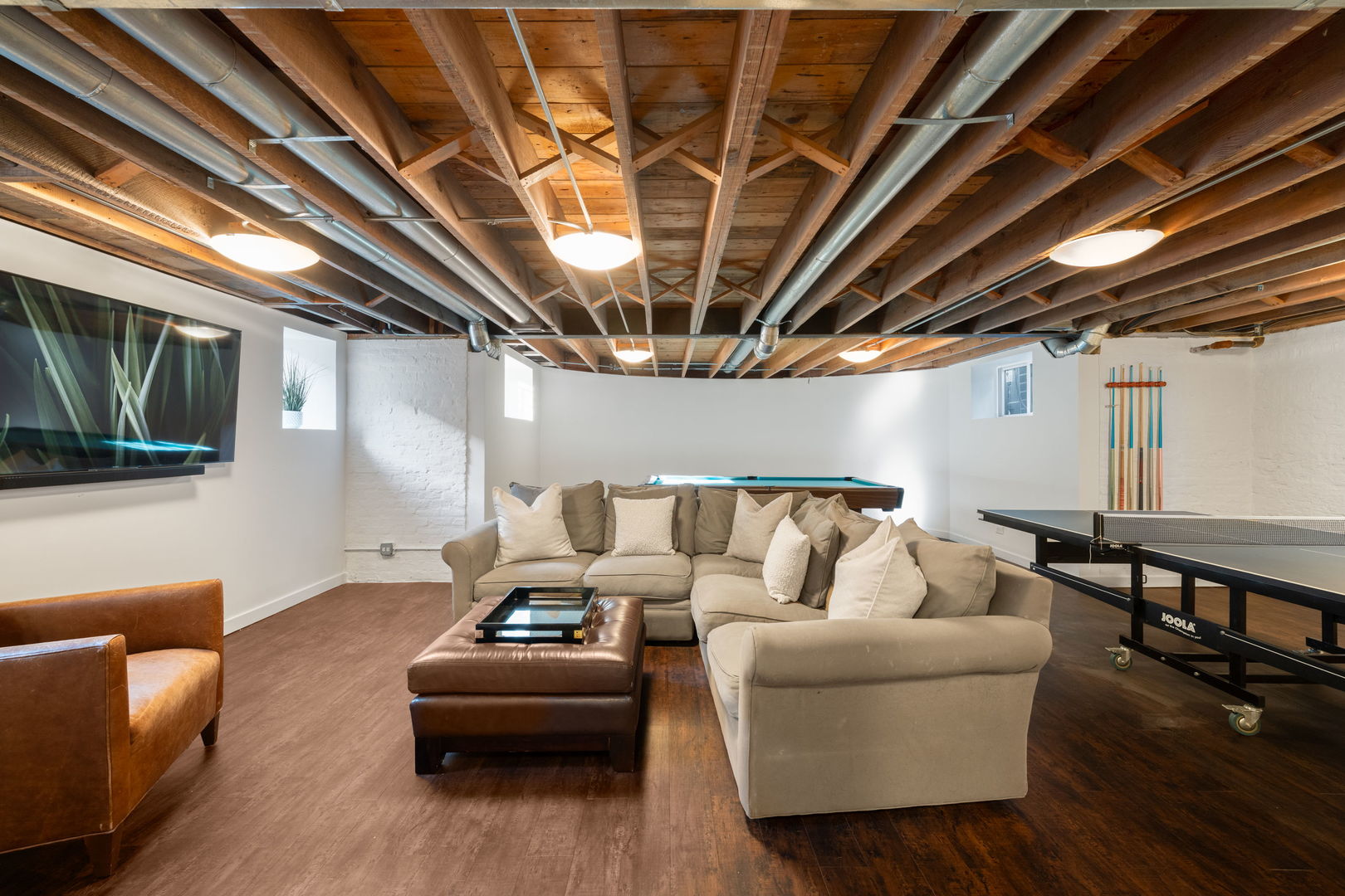 693 Sheridan Road Wilmette, IL 60091 - Photo 30 of 45 a living room with furniture and a flat screen tv