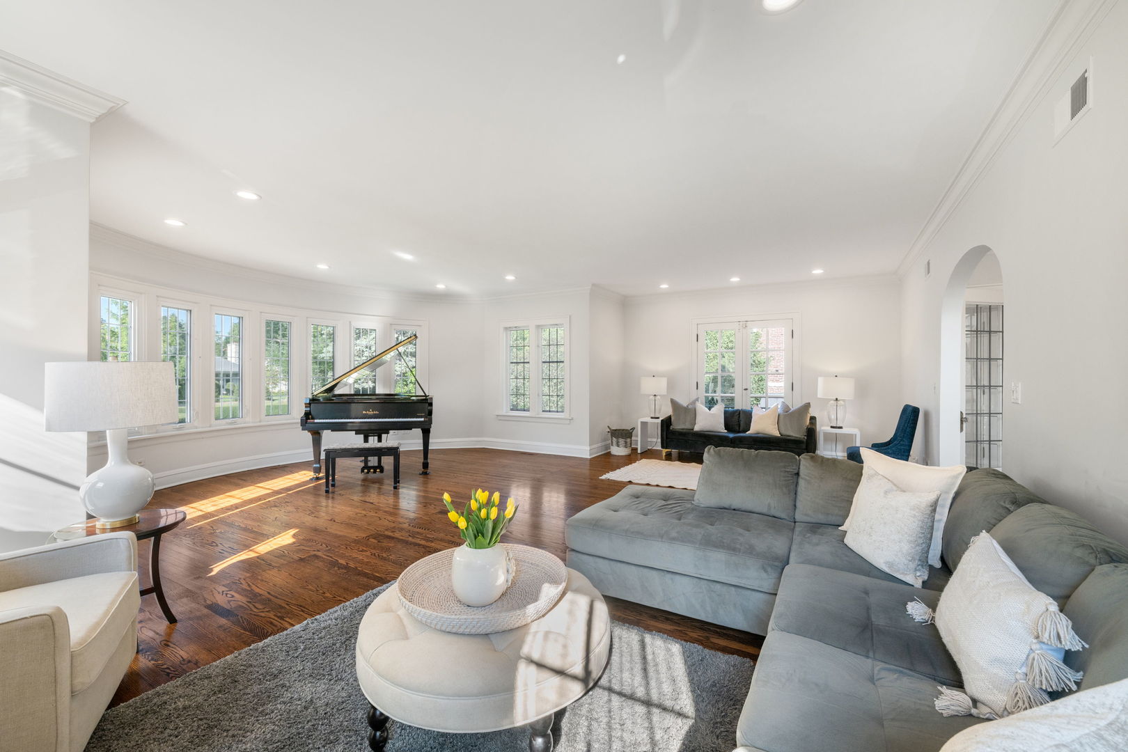 693 Sheridan Road Wilmette, IL 60091 - Photo 9 of 45 a living room with furniture and a dining table with wooden floor