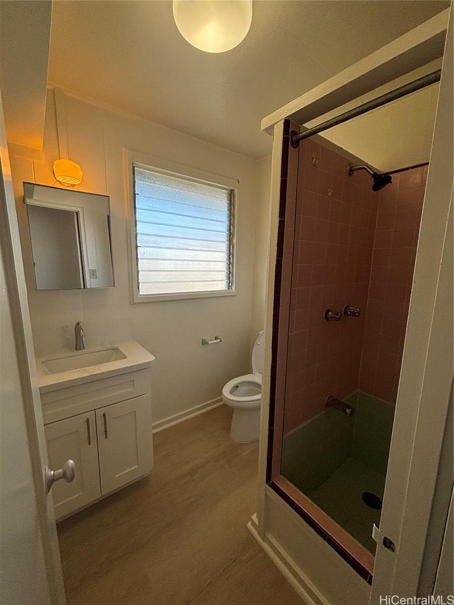 2904 Varsity Circle, Unit 3 Honolulu, HI 96826 - Photo 4 of 5 a bathroom with a shower and a sink