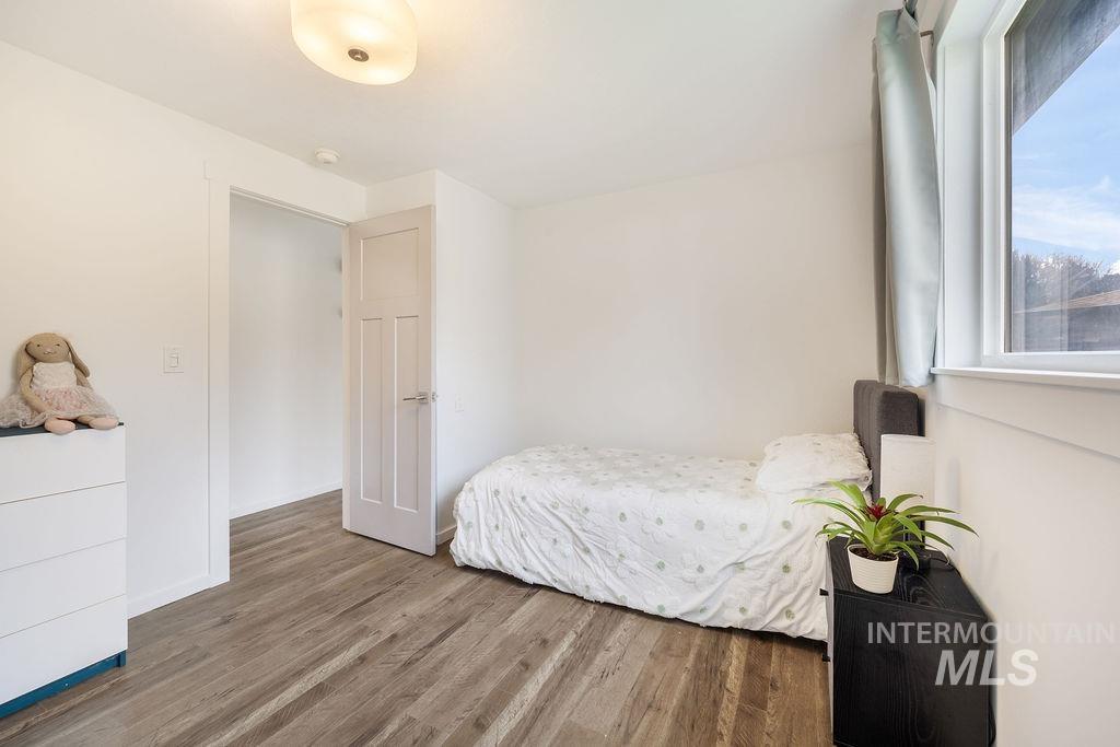 405 North 2nd Street Eagle, ID 83616 - Photo 18 of 39 Bedroom with wood finished floors and baseboards