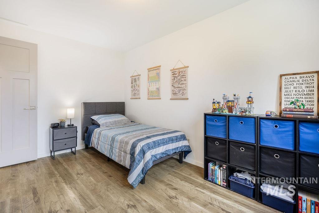 405 North 2nd Street Eagle, ID 83616 - Photo 21 of 39 Bedroom featuring light wood finished floors