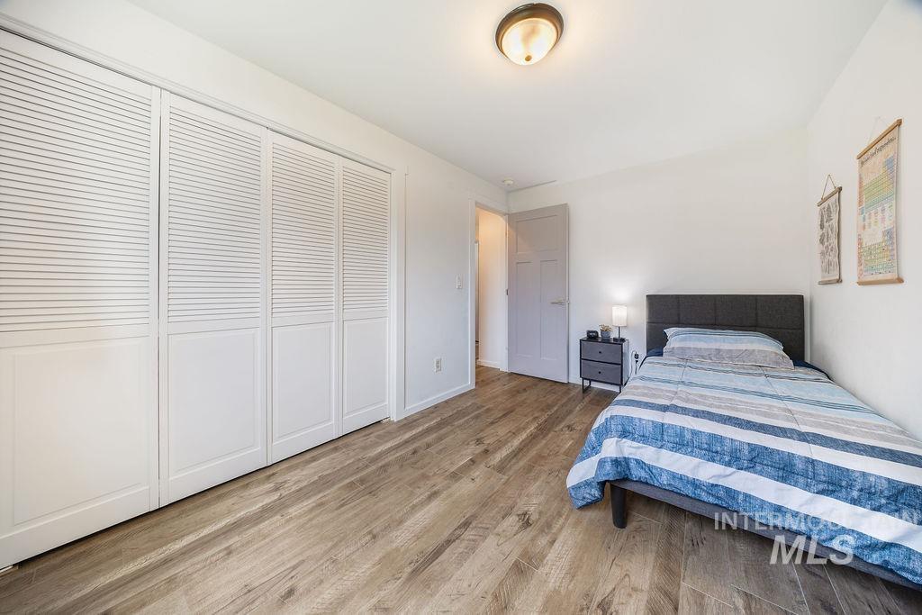 405 North 2nd Street Eagle, ID 83616 - Photo 22 of 39 Bedroom featuring wood finished floors and a closet