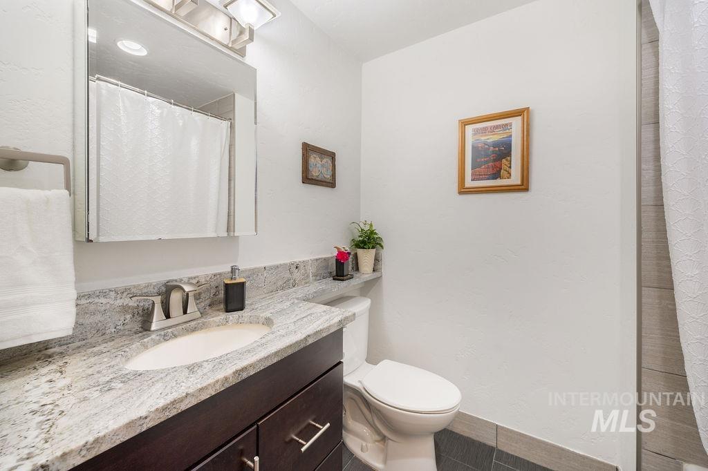 405 North 2nd Street Eagle, ID 83616 - Photo 23 of 39 Full bath with vanity and a shower with curtain