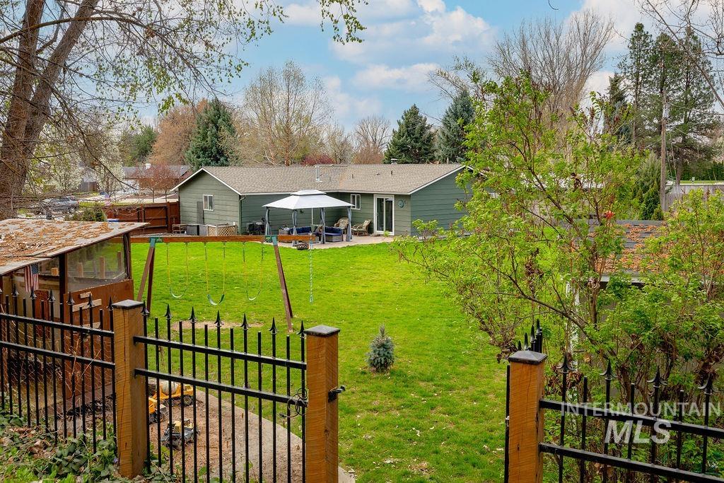 405 North 2nd Street Eagle, ID 83616 - Photo 35 of 39 Back of property with a gazebo and a patio area