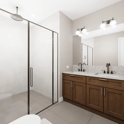 a bathroom with a double vanity sink and mirror