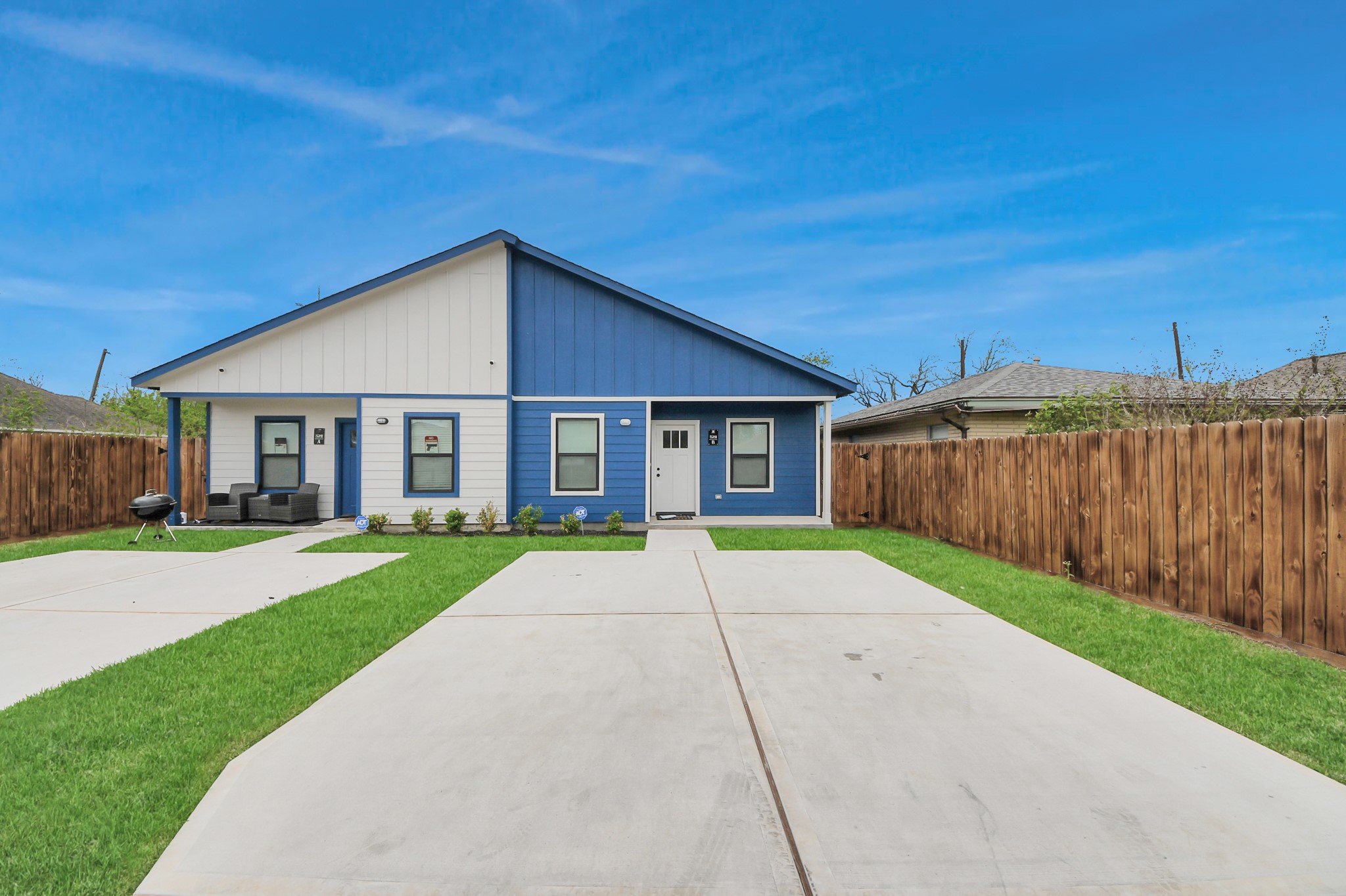 5211 Amy Street, Unit B Houston, TX 77028 - Photo 1 of 17 a view of brick house with a yard