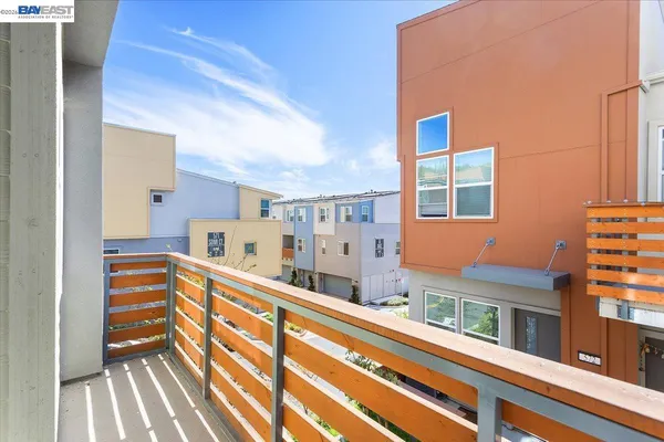 a view of balcony with furniture