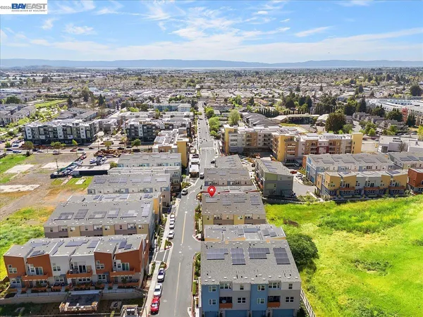 an aerial view of a city with lots of residential buildings