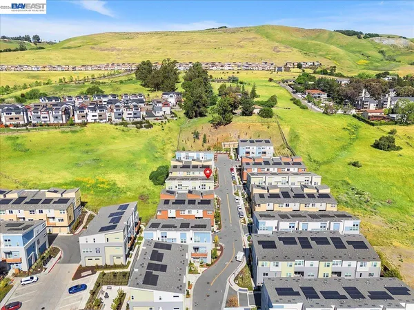 a view of a city with an ocean view