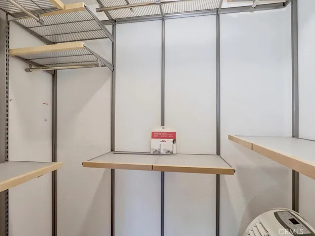 a bathroom with a shower and a sink