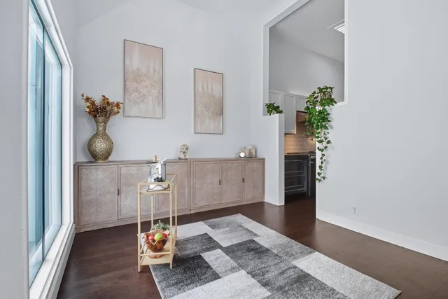 a kitchen with stainless steel appliances a sink and a stove