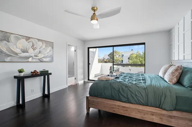 a bedroom with furniture and a window
