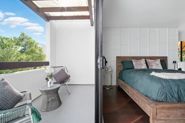 a bathroom with a tub a sink and a shower