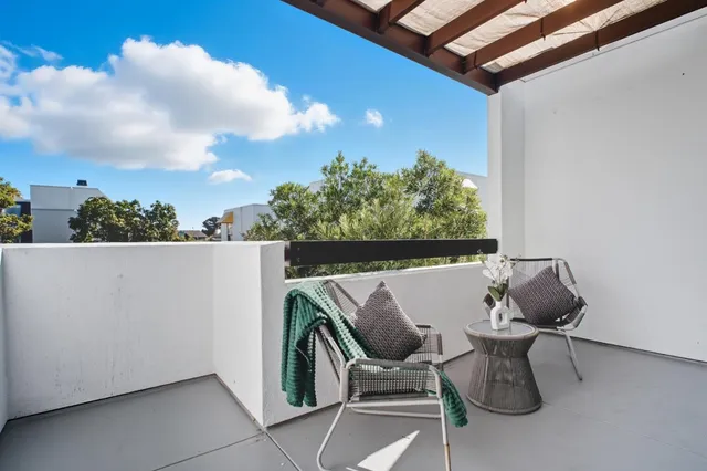 a bathroom with a sink toilet and mirror