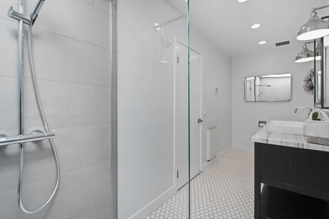 a view of storage and utility room with washer and dryer