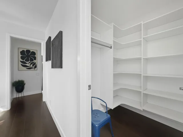 an aerial view of a city with lots of residential buildings