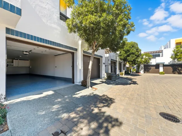 a view of a backyard of the house