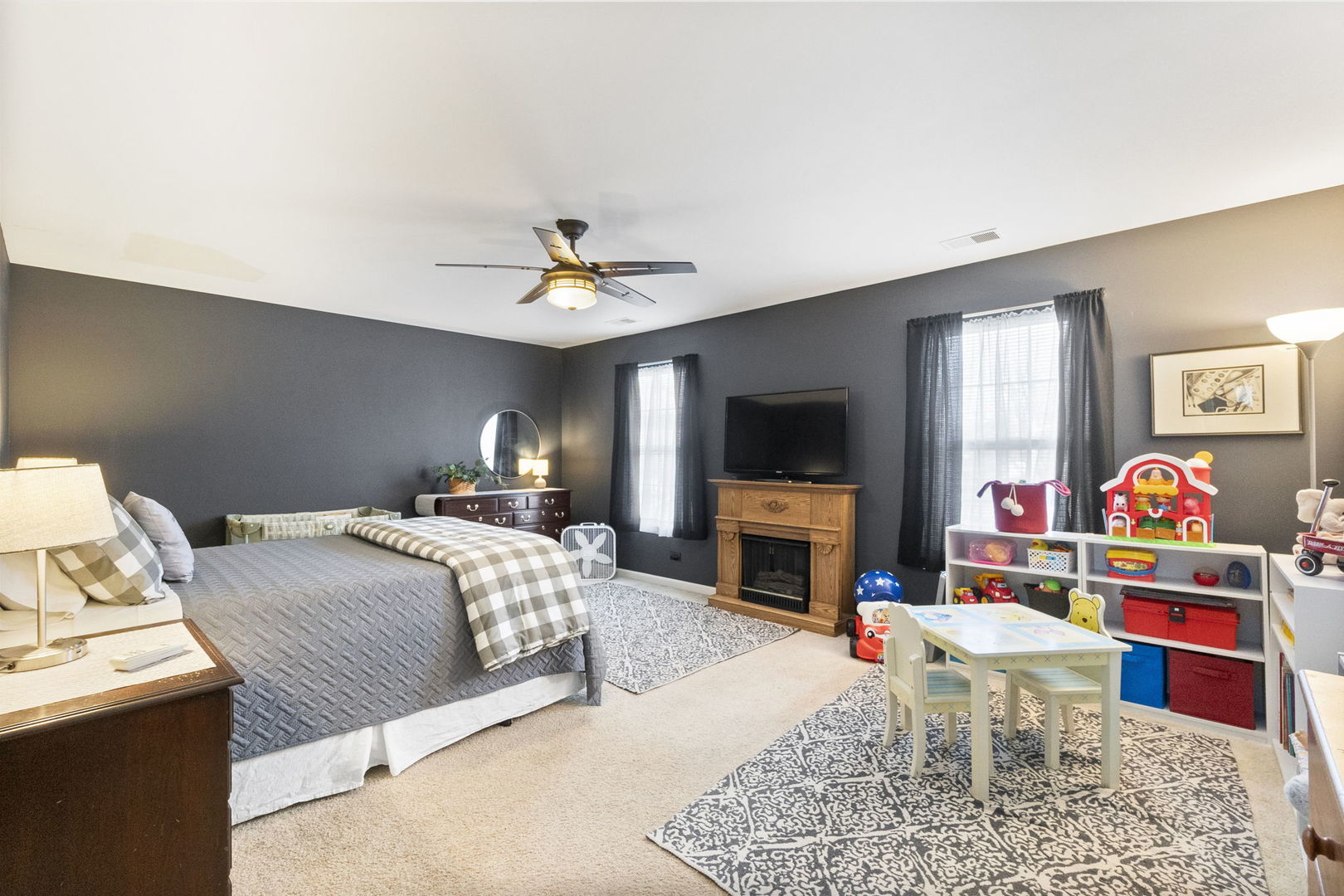 388 Ridge Road North Aurora, IL 60542 - Photo 11 of 15 a bedroom with a bed and a flat screen tv