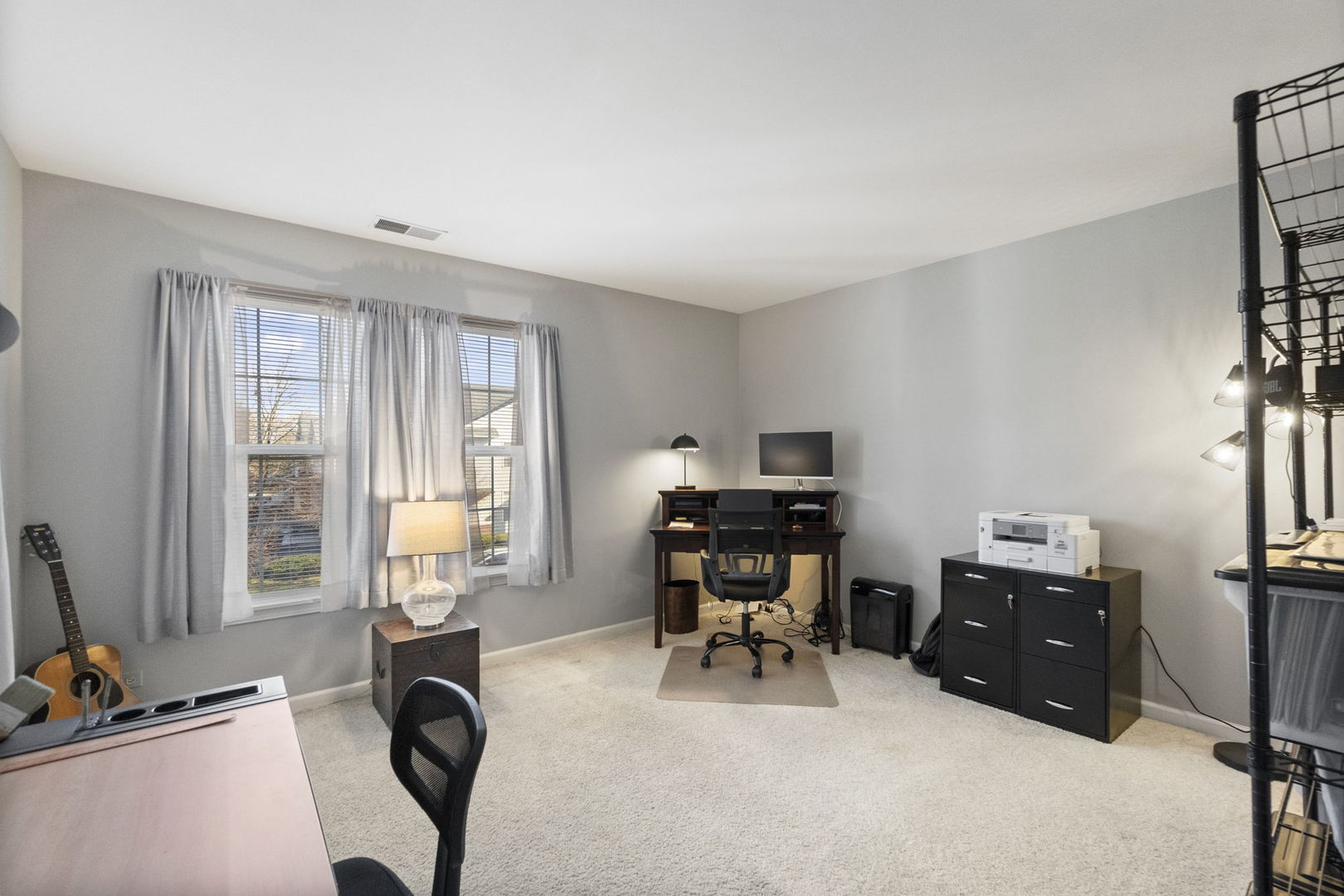388 Ridge Road North Aurora, IL 60542 - Photo 12 of 15 a view of a workspace with furniture and a window
