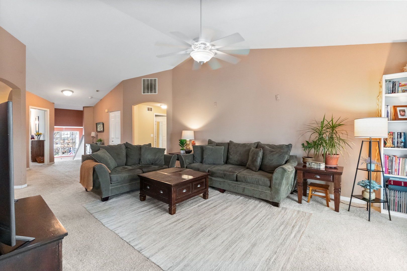 388 Ridge Road North Aurora, IL 60542 - Photo 2 of 15 a living room with furniture and a chandelier