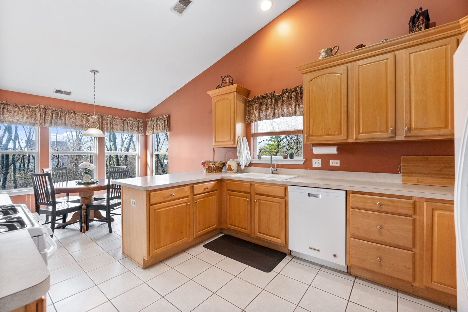 388 Ridge Road North Aurora, IL 60542 - Photo 5 of 15 a kitchen with granite countertop appliances cabinets and furniture