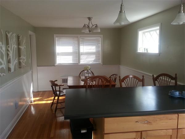 29 Myopia Road Boston, MA 02136 - Photo 6 of 17 a view of a dining room with furniture and wooden floor