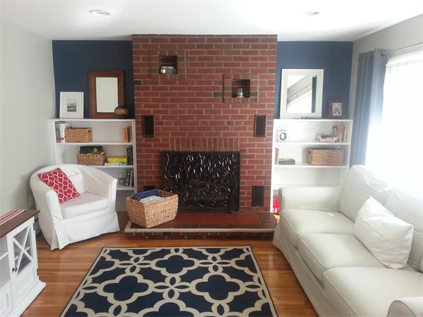 29 Myopia Road Boston, MA 02136 - Photo 7 of 17 a living room with furniture and a fireplace