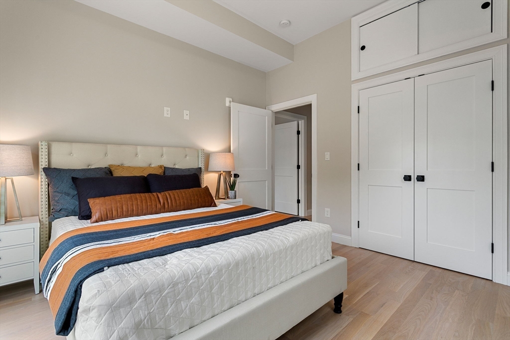 32 Wentworth Street, Unit 2 Boston, MA 02124 - Photo 11 of 23 a bedroom with double bed and a closet