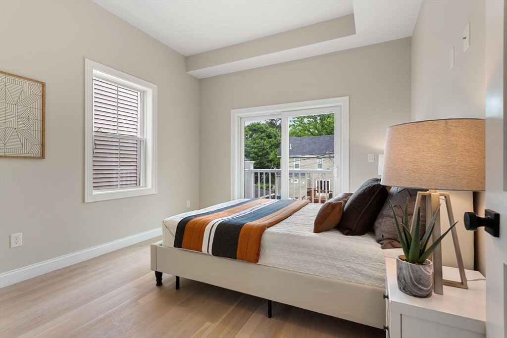 32 Wentworth Street, Unit 2 Boston, MA 02124 - Photo 13 of 23 a bedroom with a bed and window