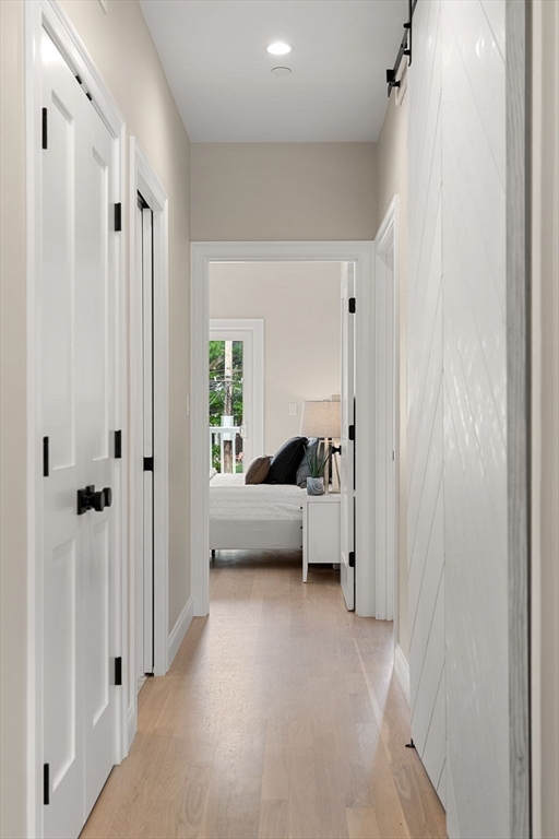 32 Wentworth Street, Unit 2 Boston, MA 02124 - Photo 15 of 23 a view of a bedroom with bed and furniture