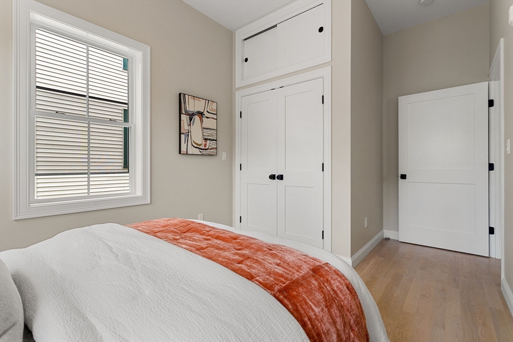 32 Wentworth Street, Unit 2 Boston, MA 02124 - Photo 16 of 23 a bedroom with a bed and a window
