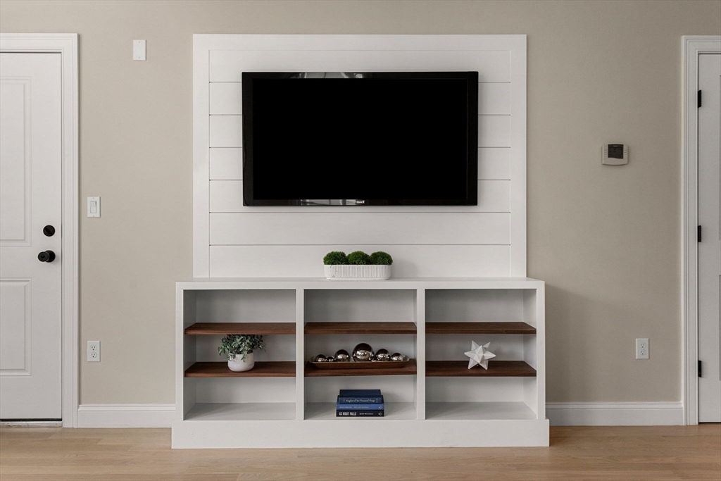 32 Wentworth Street, Unit 2 Boston, MA 02124 - Photo 7 of 23 a living room with furniture and a flat screen tv