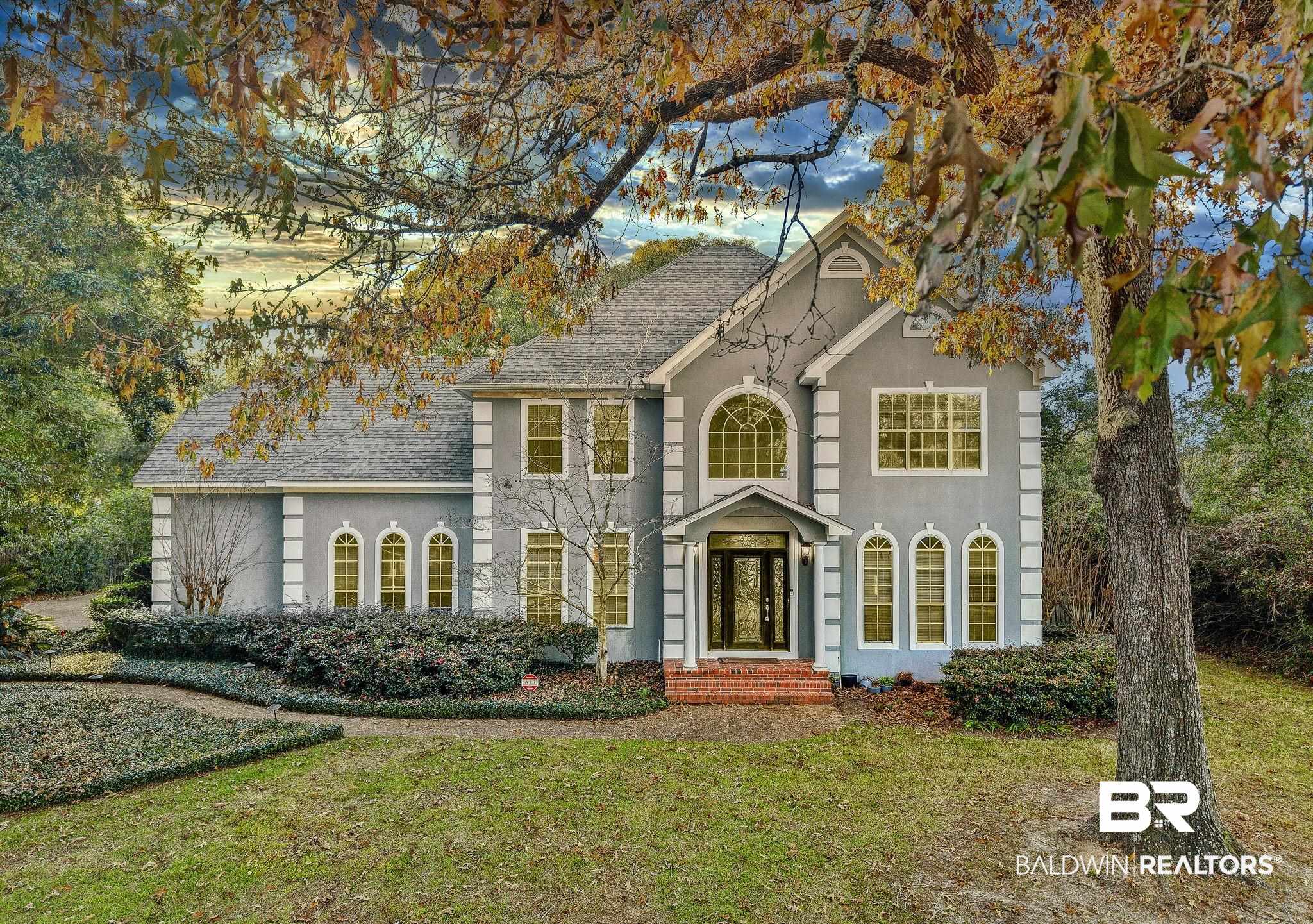 2100 Stonebrook Drive West Mobile, AL 36695 - Photo 2 of 60 View of front facade featuring french doors and a front yard