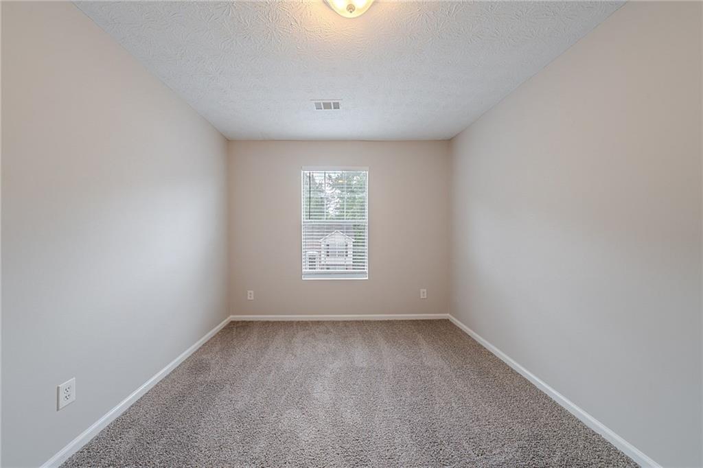 2183 Ramblewood Circle Decatur, GA 30035 - Photo 17 of 37 an empty room with a window