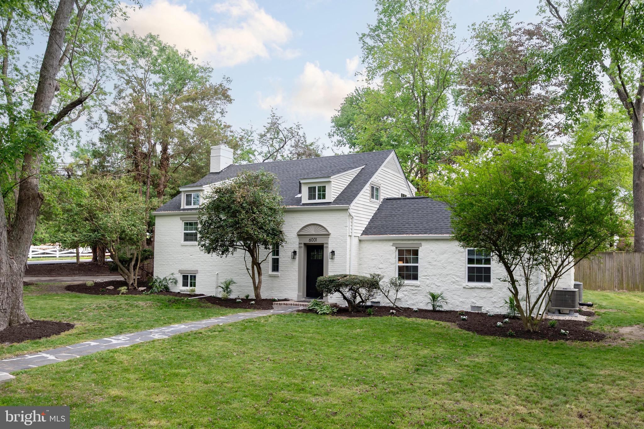 6001 Beech Tree Drive Alexandria, VA 22310 - Photo 1 of 63 a front view of house with a garden