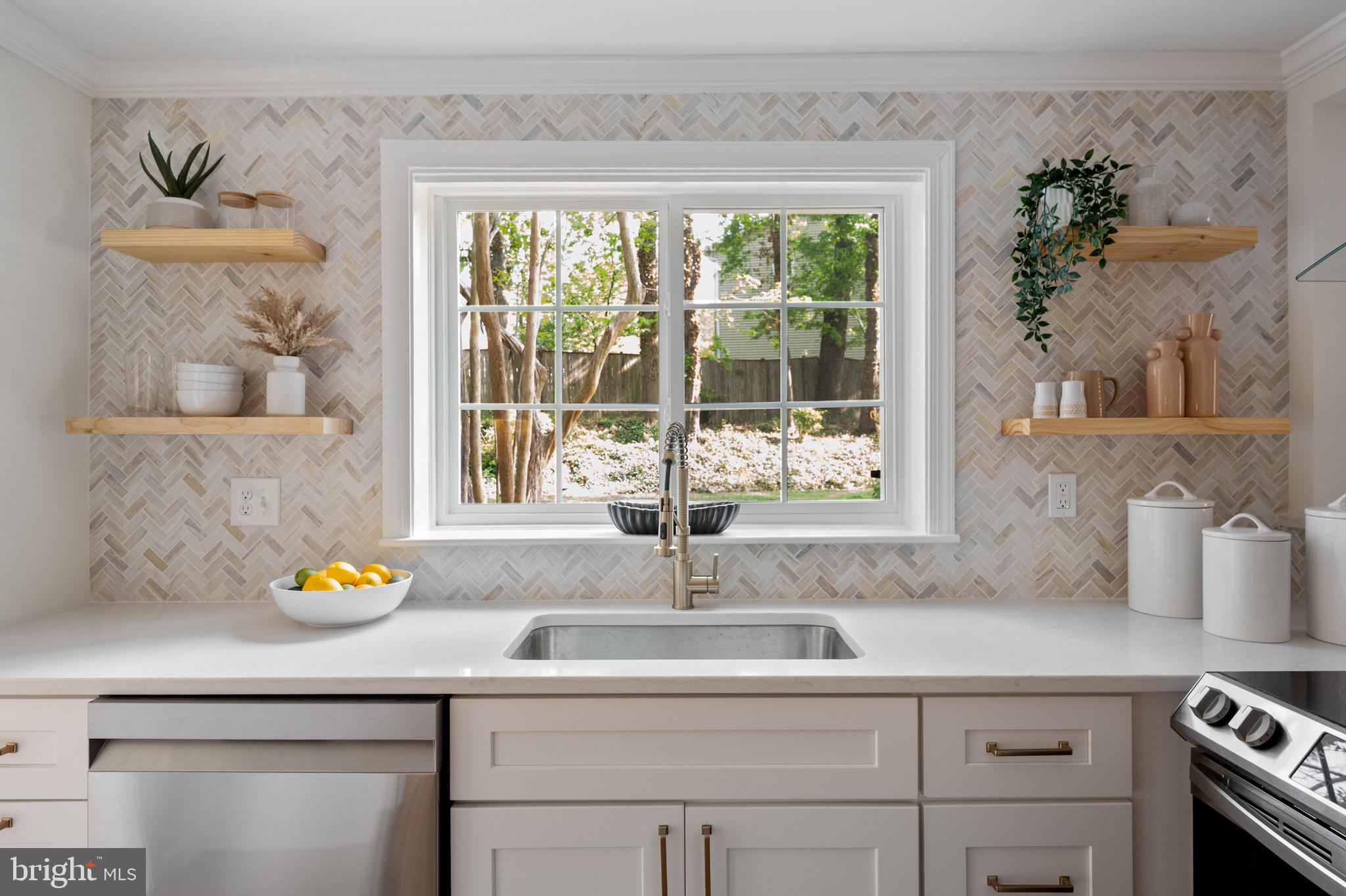 6001 Beech Tree Drive Alexandria, VA 22310 - Photo 33 of 63 a kitchen with a sink and a window