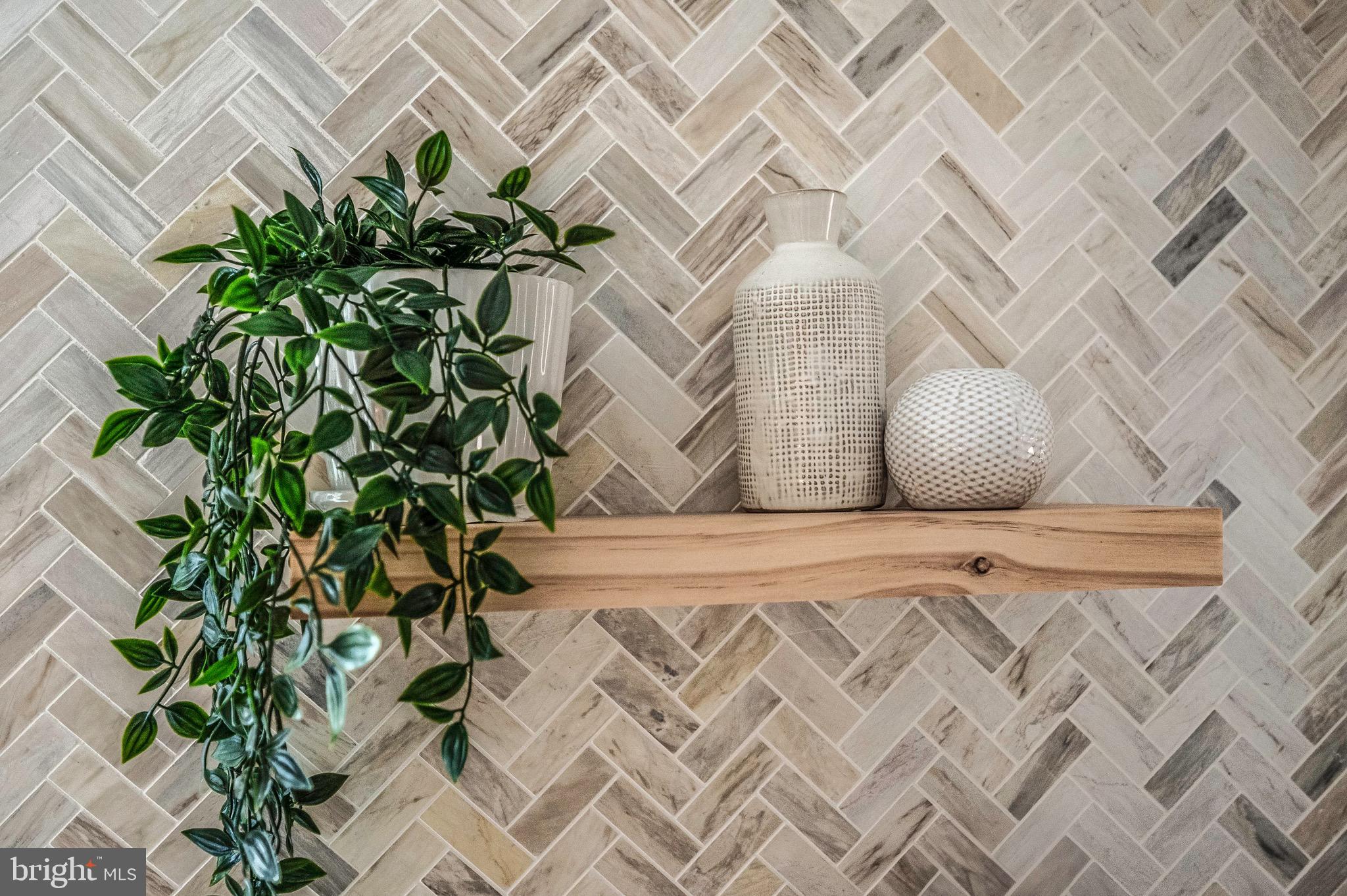 6001 Beech Tree Drive Alexandria, VA 22310 - Photo 34 of 63 a vase of flowers sitting on a bed