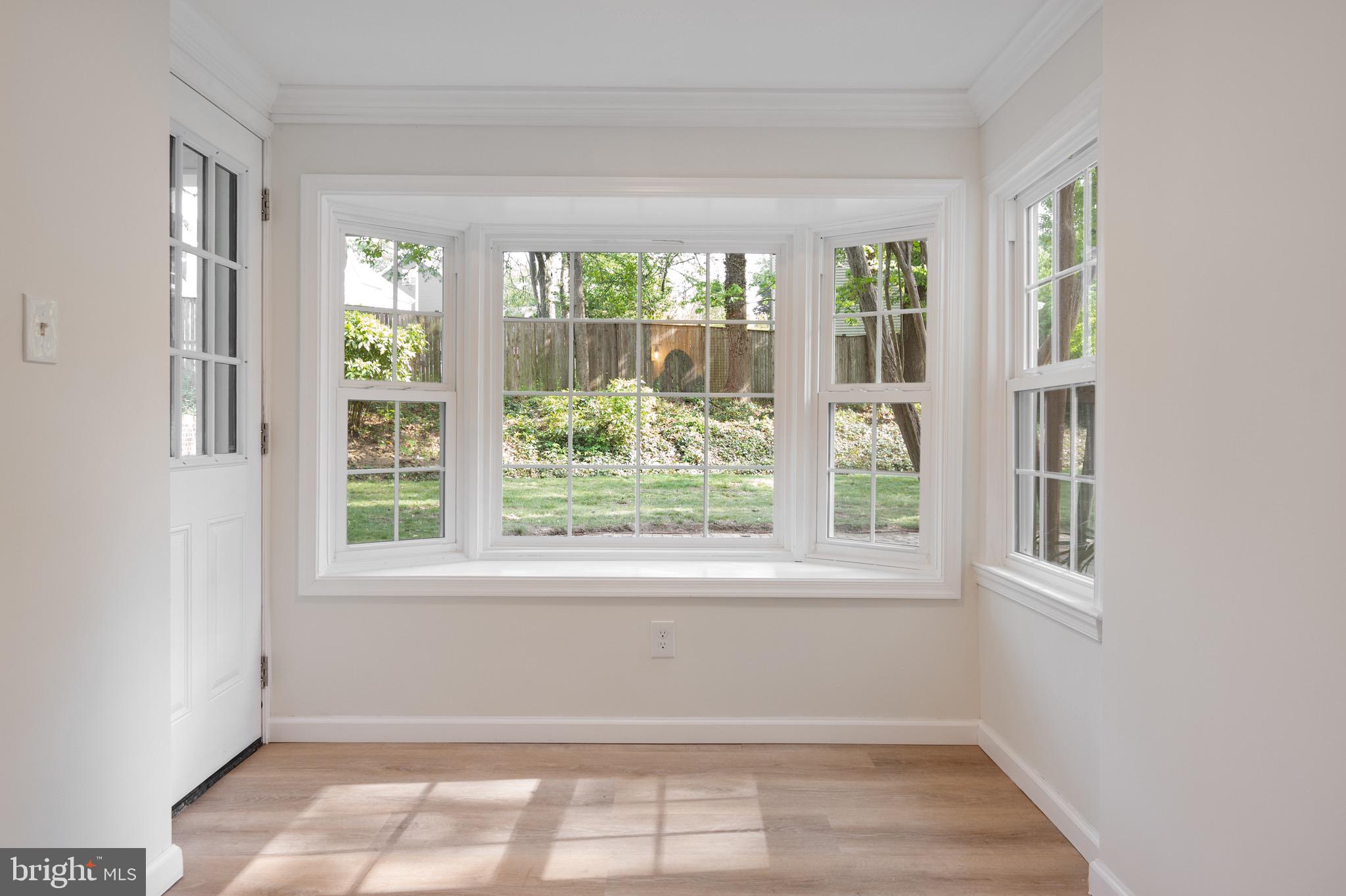 6001 Beech Tree Drive Alexandria, VA 22310 - Photo 37 of 63 a view of empty room with wooden floor and fan