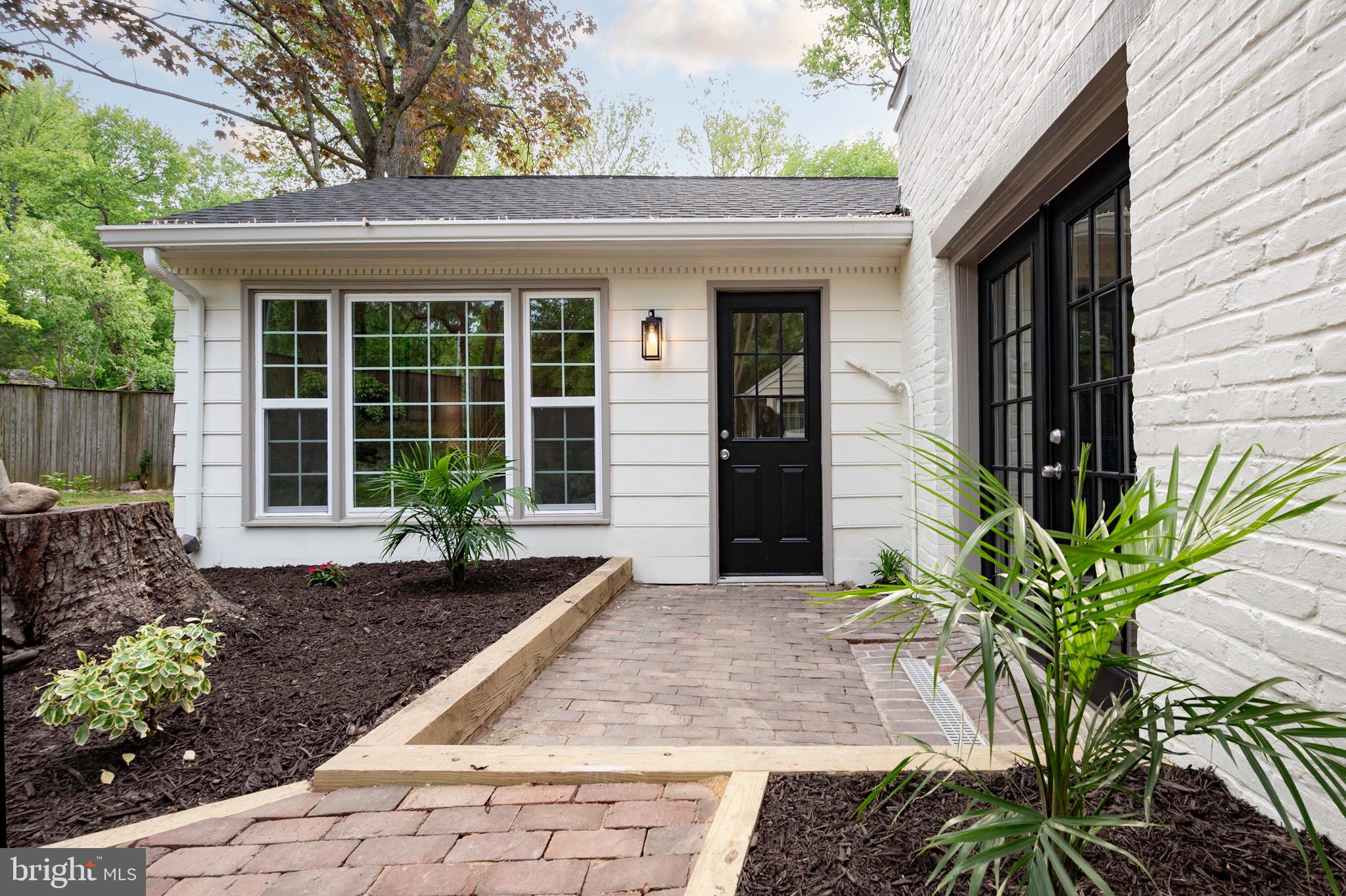 6001 Beech Tree Drive Alexandria, VA 22310 - Photo 7 of 63 a front view of a house with garden