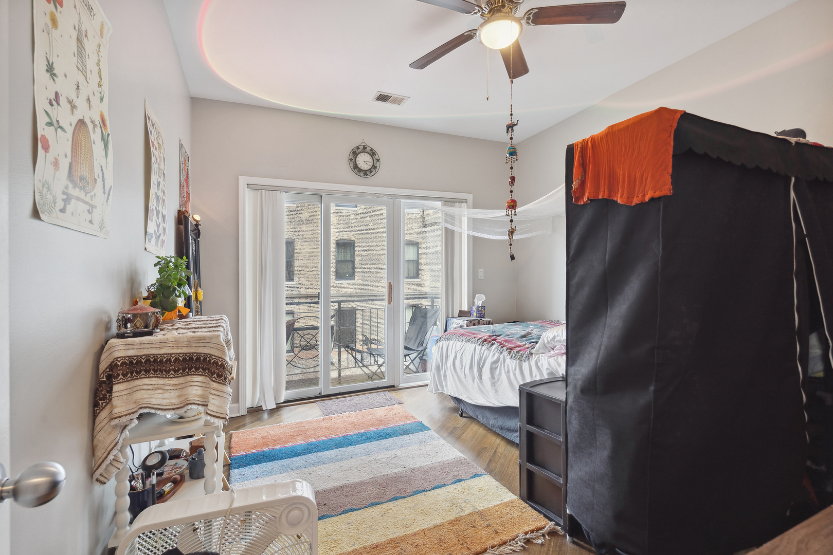 531 North Racine Avenue, Unit 3 Chicago, IL 60642 - Photo 16 of 22 a living room with furniture flowerpot and a rug